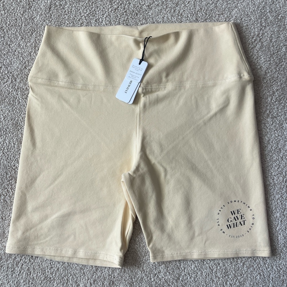 0307 - WEWOREWHAT We Gave What Biker Shorts Butter Yellow M/L
